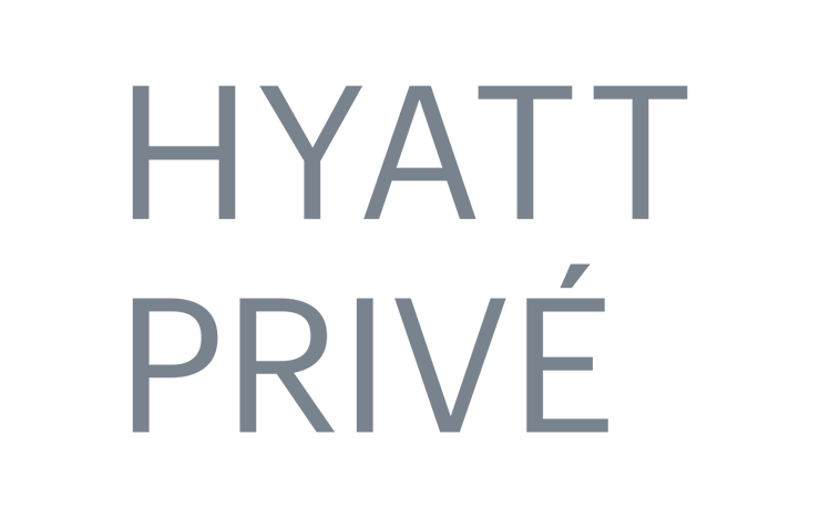 Hyatt Privé interior design with furniture and lampshade.