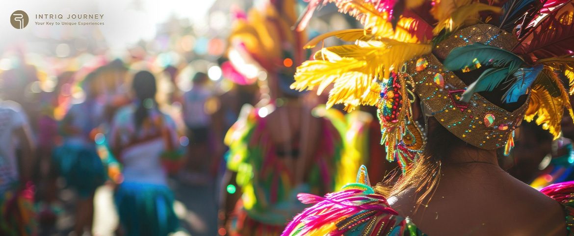 Performers wearing colorful feathered costumes at Colombia's luxury festival.