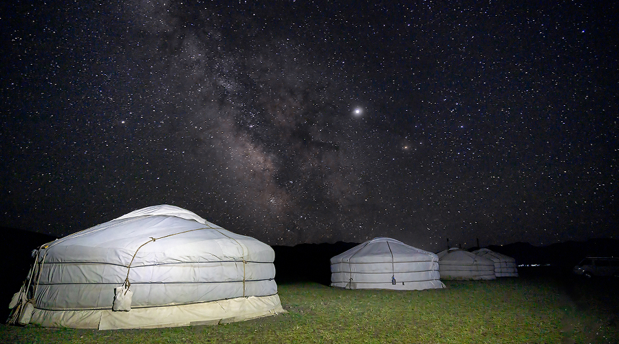 Traditional-Mongolian-ger-tents-under-the-starlit-Gobi-sky